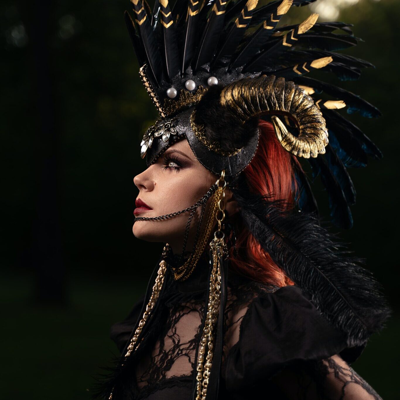 Photo by Miguel Gonzalez on Unsplash, red haired, yellow-eye woman in a horned helmet