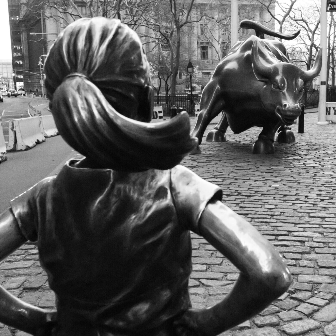 Wall Street bull with girls, statue, black and white