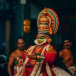 a masked Kathakali dancer